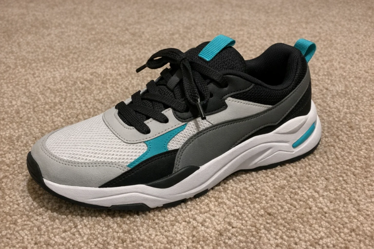 Sneaker on a plain carpet