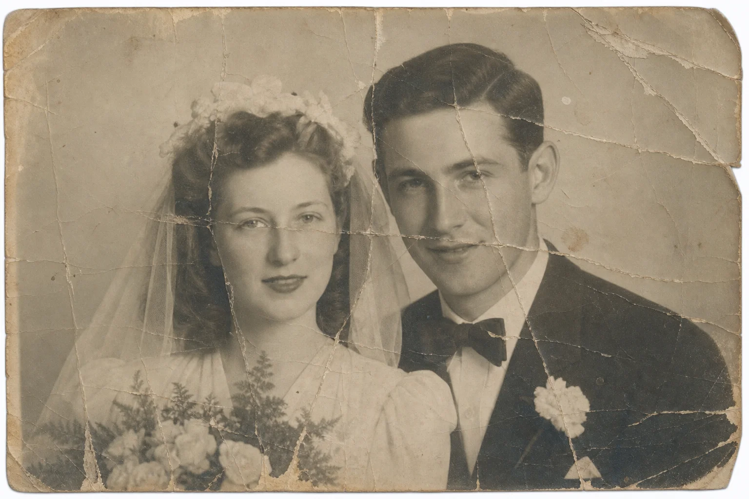 Creased and faded wedding photo